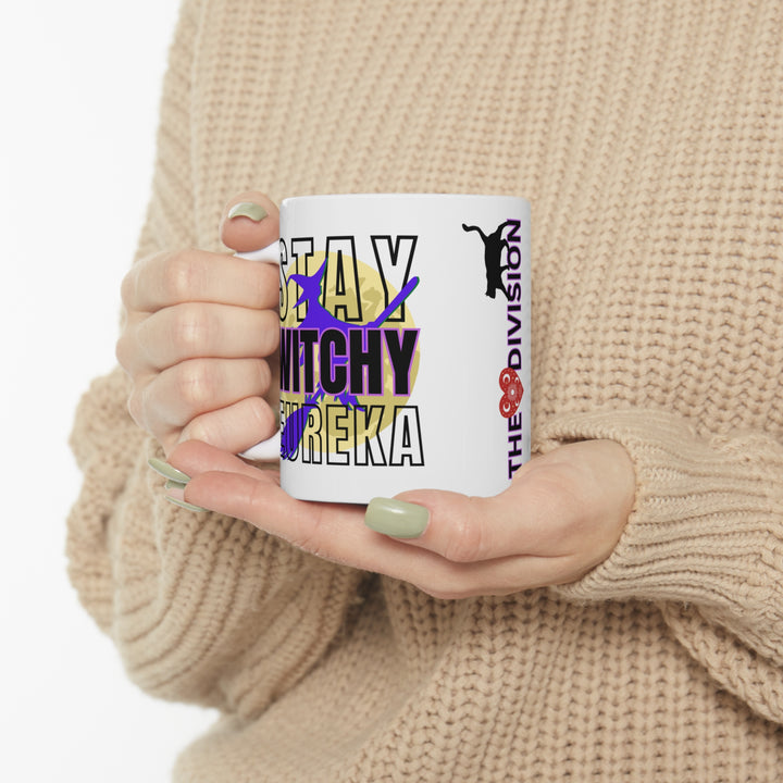 Holding the Stay Witchy Eureka Mug