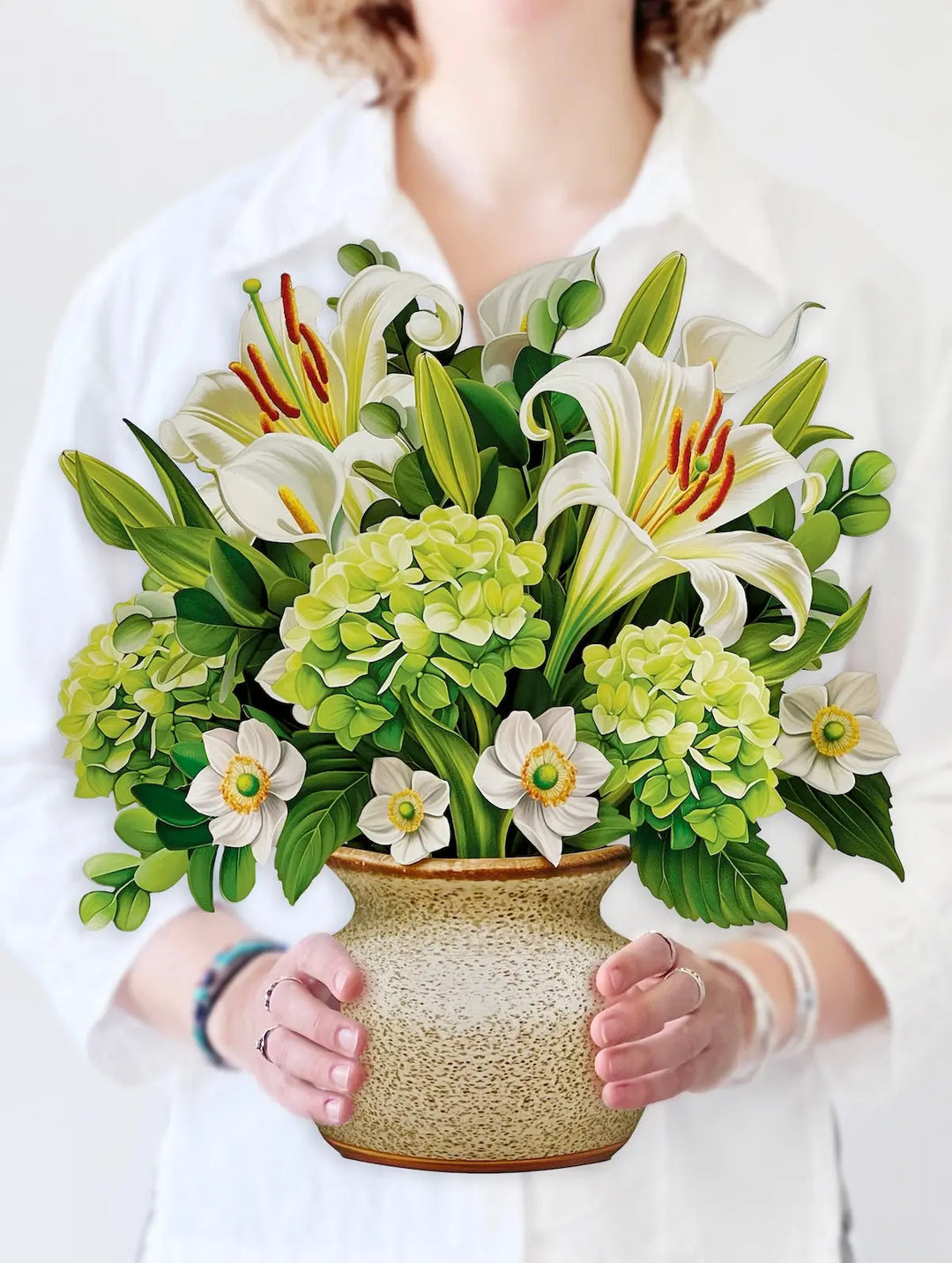 Pop-up card with neutral ivory blooms and soft sage greenery, modern and chic.