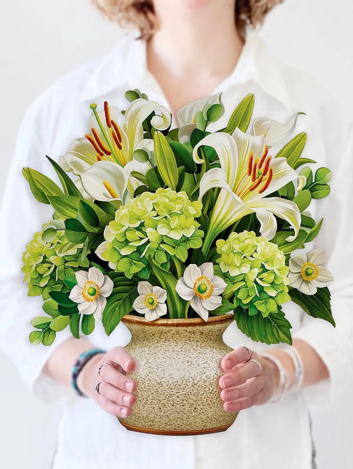 Pop-up card with neutral ivory blooms and soft sage greenery, modern and chic.