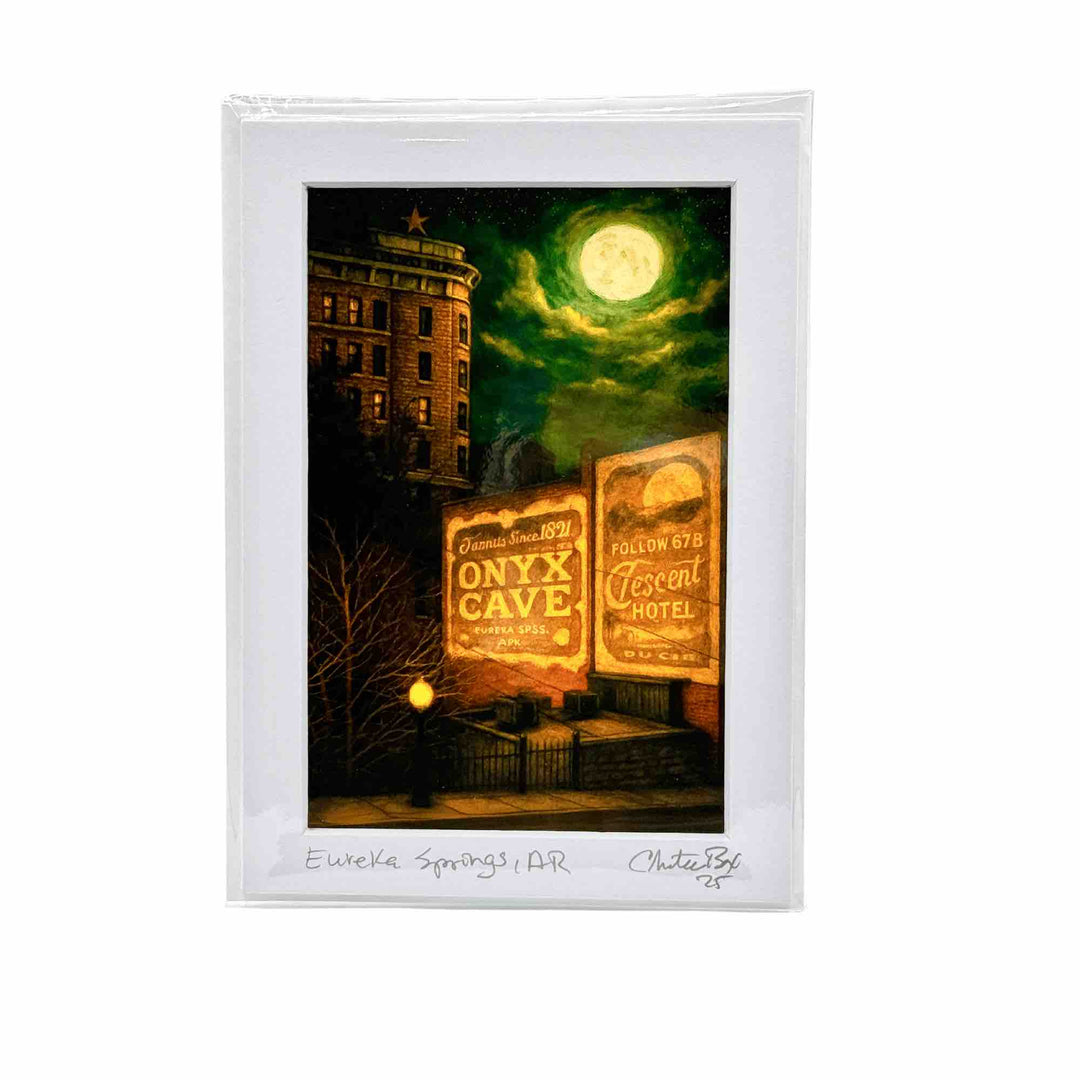Greeting card art print of the historic Basin Park Hotel in Eureka Springs AR lit by soft winter moonlight.