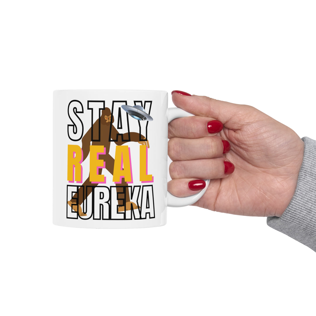 Stay Real Eureka Mug being held