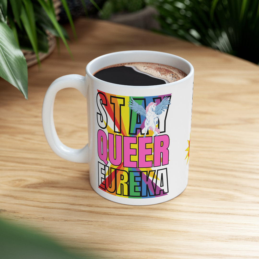 Stay Queer Eureka mug with coffee