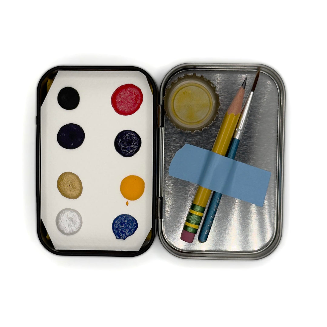 The Colors of the Heart Division Watercolor Palette open tin