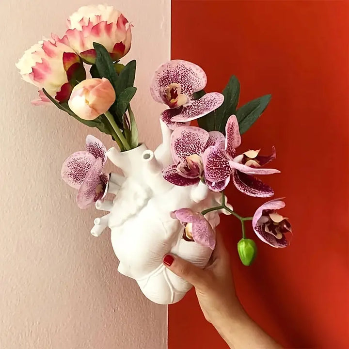 Decorative White Human Heart Vase with flowers